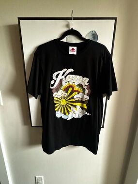 Kappa Black Tee with Yellow & White Retro Sun Graphic